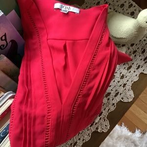 Q&A Red sleeveless blouse